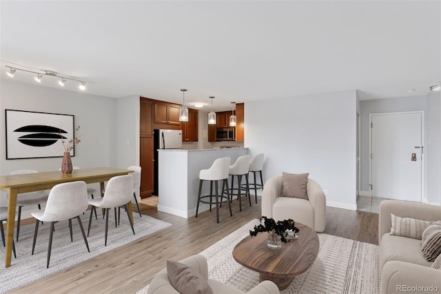 480 S Marion Pkwy Unit 802, Denver, CO 80209 - living area with light wood finished floors and baseboards