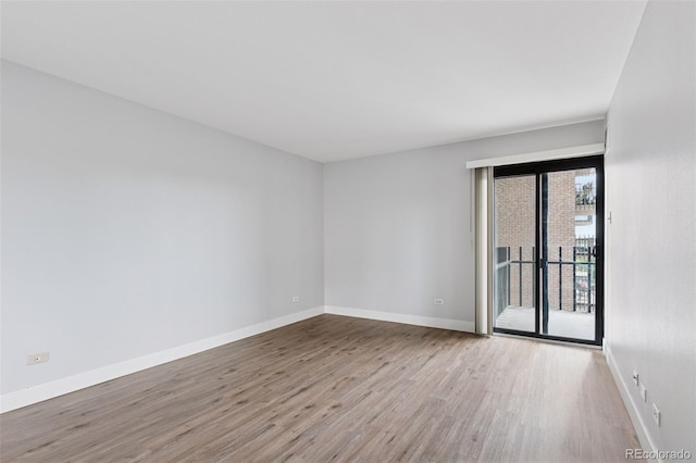 480 S Marion Pkwy Unit 802, Denver, CO 80209 - unfurnished room with wood finished floors and baseboards