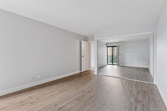 480 S Marion Pkwy Unit 802, Denver, CO 80209 - spare room with wood finished floors and baseboards