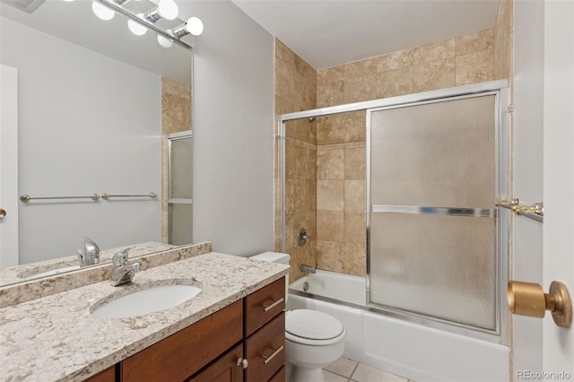 480 S Marion Pkwy Unit 802, Denver, CO 80209 - full bath featuring vanity, toilet, combined bath / shower with glass door, and tile patterned floors