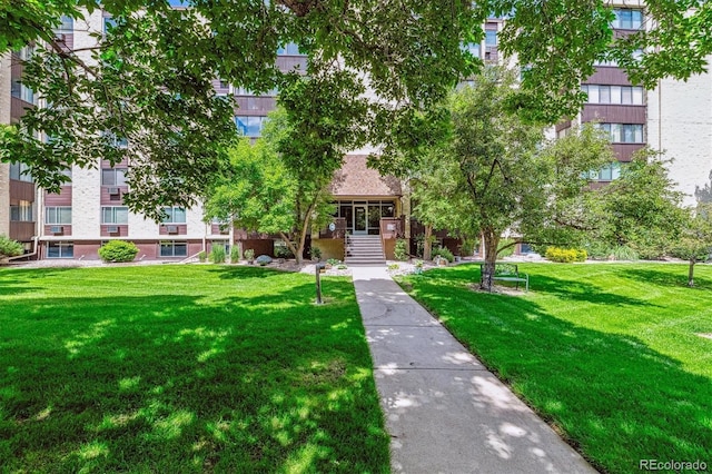 3465 S Poplar St Unit 506, Denver, CO 80224 - view of home's community featuring a lawn