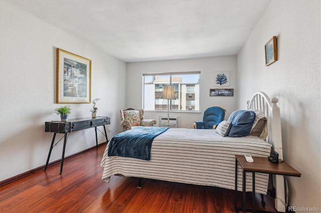 3465 S Poplar St Unit 506, Denver, CO 80224 - bedroom with wood finished floors and baseboards