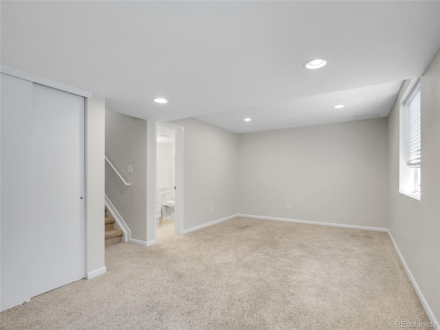 1288 S Beeler Ct, Denver, CO 80247 - below grade area with carpet, stairs, and recessed lighting