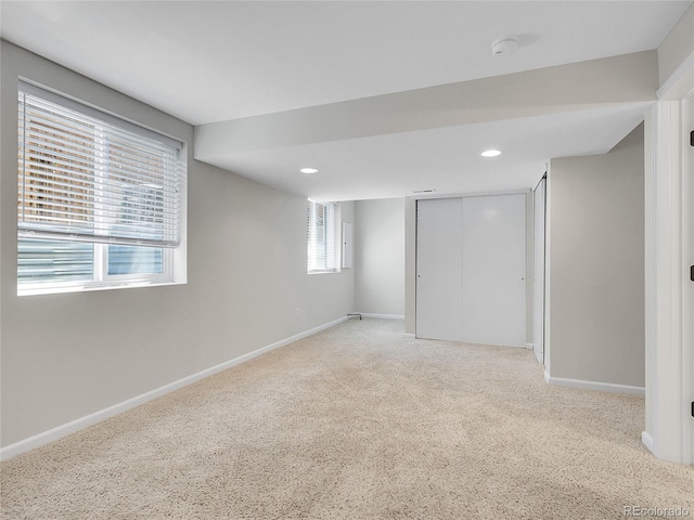 1288 S Beeler Ct, Denver, CO 80247 - unfurnished bedroom with light colored carpet, a closet, and recessed lighting