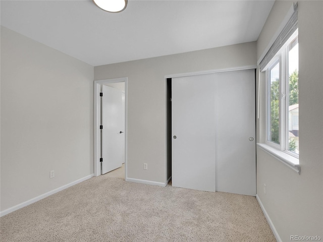 1288 S Beeler Ct, Denver, CO 80247 - unfurnished bedroom featuring a closet and carpet floors