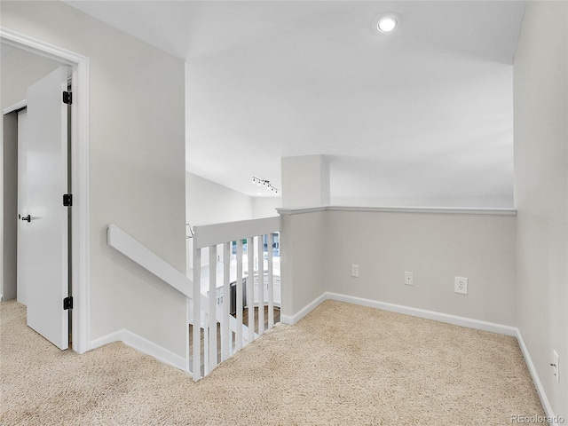 1288 S Beeler Ct, Denver, CO 80247 - hallway with carpet floors, an upstairs landing, recessed lighting, and lofted ceiling