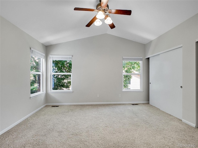 1288 S Beeler Ct, Denver, CO 80247 - unfurnished bedroom with carpet flooring, vaulted ceiling, and ceiling fan