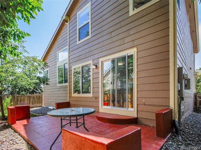 1288 S Beeler Ct, Denver, CO 80247 - rear view of house with a patio area