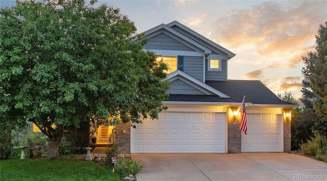 view of front of property with a garage