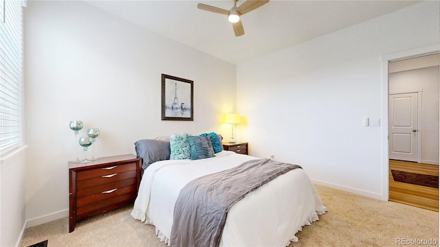 13488 Wabash St, Thornton, CO 80602 - bedroom featuring light carpet, baseboards, and a ceiling fan