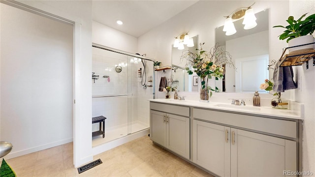 13488 Wabash St, Thornton, CO 80602 - bathroom with double vanity, a stall shower, and tile patterned floors