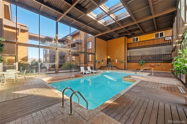 view of swimming pool featuring a deck