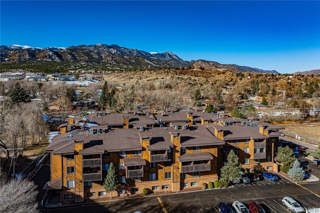 drone / aerial view featuring a mountain view