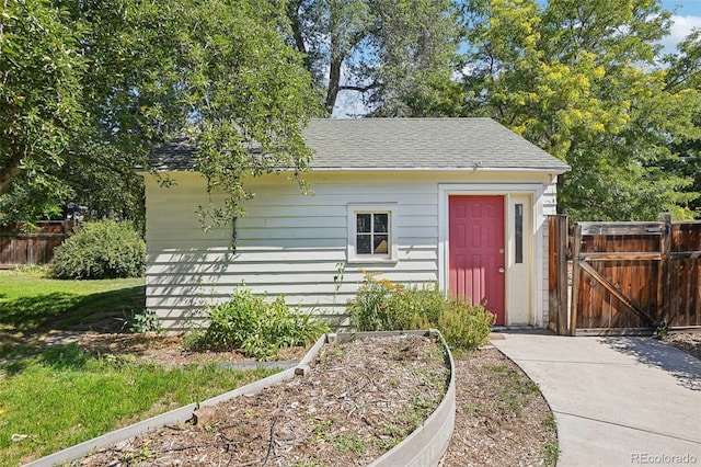 1100 W Mulberry St, Fort Collins, CO 80521 - view of outdoor structure featuring fence, an outbuilding, and a gate