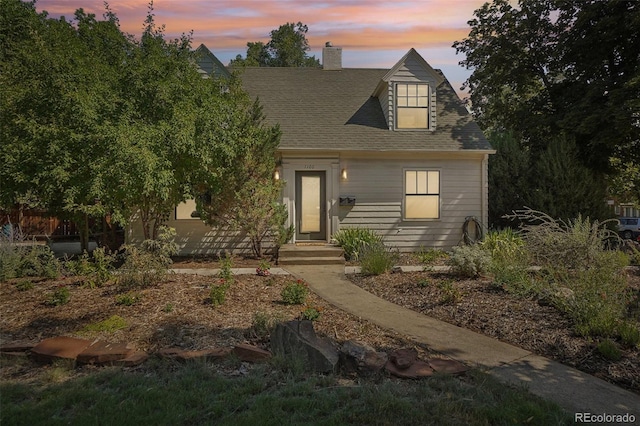 1100 W Mulberry St, Fort Collins, CO 80521 - view of front facade with a shingled roof and a chimney