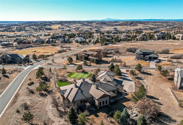 drone / aerial view featuring a mountain view