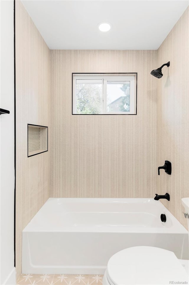 full bathroom with toilet and shower / tub combination