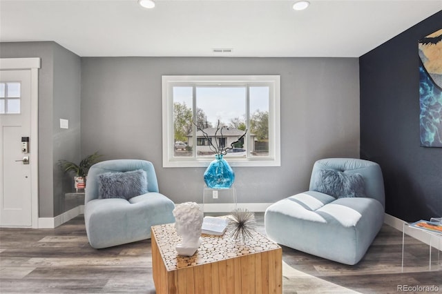 sitting room featuring a wealth of natural light, visible vents, and recessed lighting