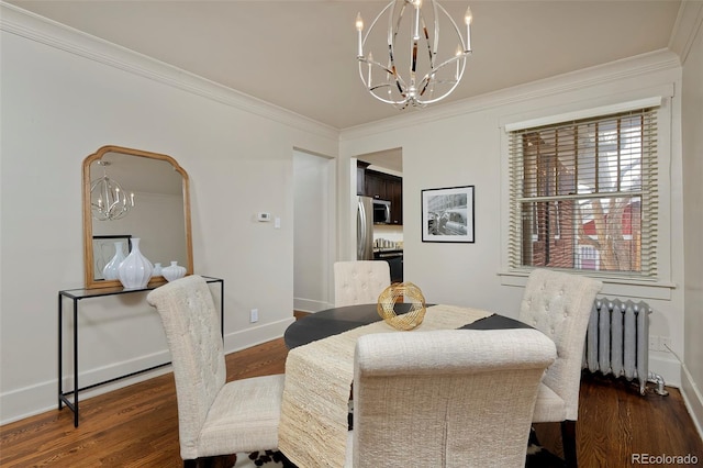 dining space with ornamental molding, dark wood-type flooring, a chandelier, and radiator