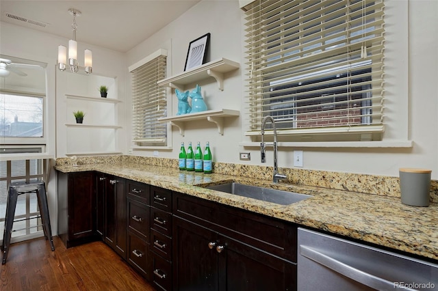 kitchen featuring dark wood-style floors, open shelves, visible vents, a sink, and dishwasher