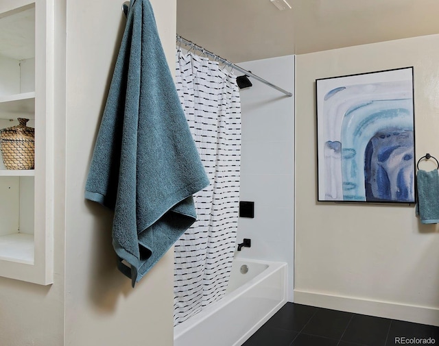 full bathroom featuring tile patterned flooring, shower / bath combo, and baseboards