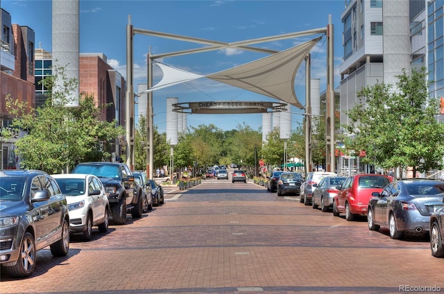 exterior space with street lighting and curbs