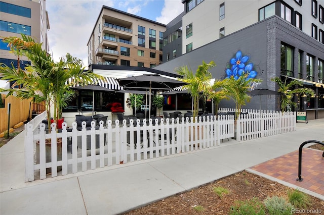 view of property's community featuring a fenced front yard