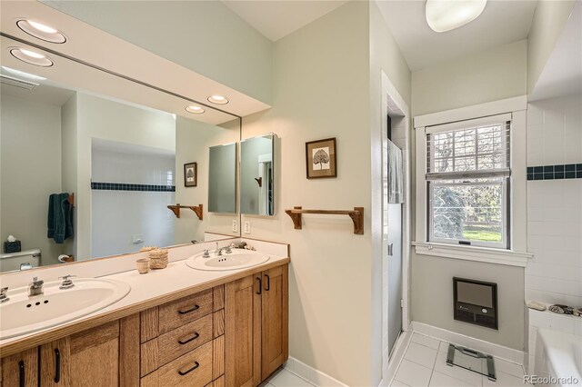 full bath with tile patterned floors, baseboards, toilet, double vanity, and recessed lighting