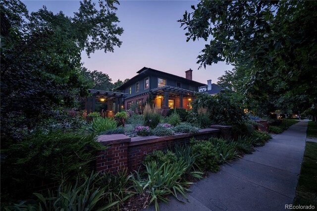 view of front of home with a chimney