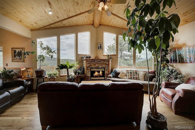 114 Star Ln, Bailey, CO 80421 - living room featuring wooden ceiling, ceiling fan, healthy amount of natural light, light wood-style flooring, and a fireplace