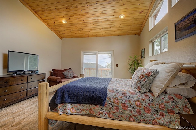 114 Star Ln, Bailey, CO 80421 - bedroom with lofted ceiling, wooden ceiling, wood finished floors, and access to outside