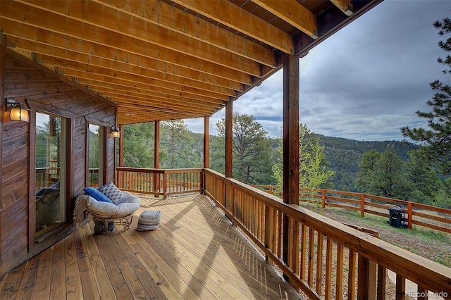 114 Star Ln, Bailey, CO 80421 - wooden deck featuring a view of trees