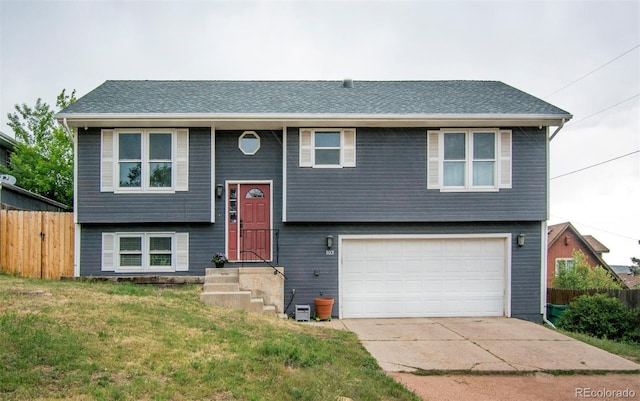 103 Aurelia St, Palmer Lake, CO 80133 - raised ranch with a garage and driveway