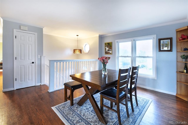 103 Aurelia St, Palmer Lake, CO 80133 - dining area featuring dark wood-type flooring and ornamental molding