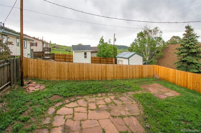 103 Aurelia St, Palmer Lake, CO 80133 - fenced backyard featuring a patio area