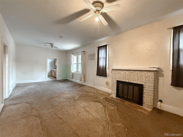 unfurnished living room featuring a brick fireplace, baseboards, and ceiling fan