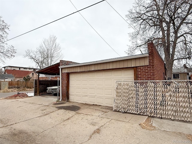 garage with fence