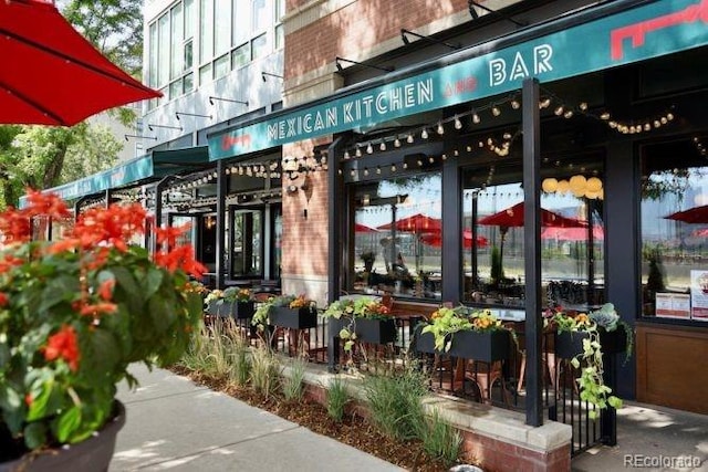 exterior space featuring brick siding