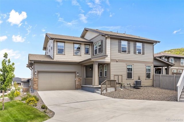 138 Lullaby Ln, Castle Rock, CO 80109 - view of front of home with driveway, an attached garage, and cooling unit