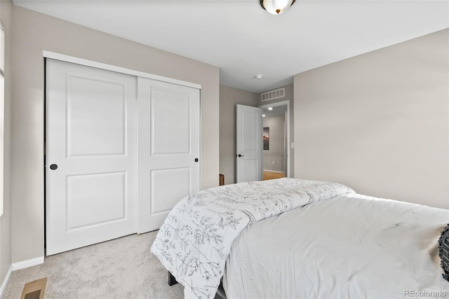 138 Lullaby Ln, Castle Rock, CO 80109 - bedroom featuring light carpet, a closet, and baseboards