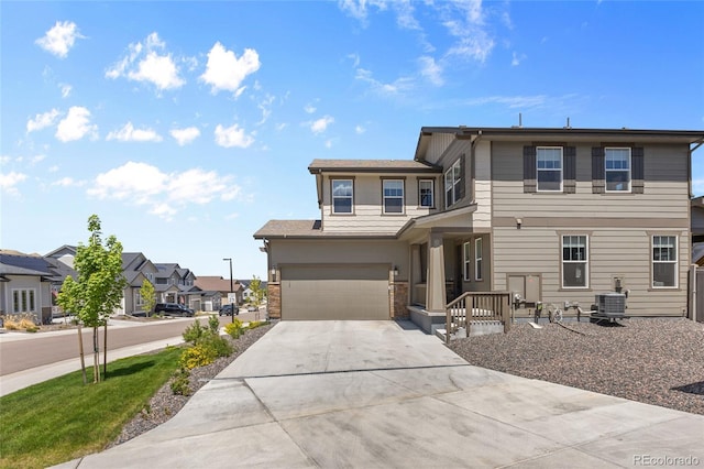 138 Lullaby Ln, Castle Rock, CO 80109 - view of front of house featuring driveway, a garage, central AC, and a residential view