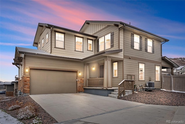 138 Lullaby Ln, Castle Rock, CO 80109 - view of front of house with a garage, driveway, and cooling unit