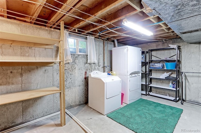 basement with washer and clothes dryer