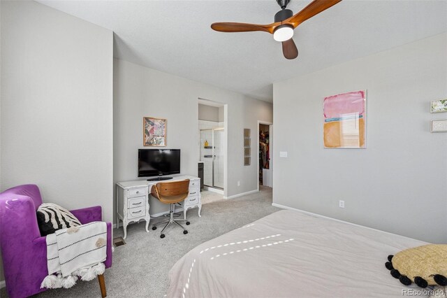 2449 Foerster Grass Vw, Colorado Springs, CO 80915 - bedroom featuring baseboards, ensuite bath, and light colored carpet