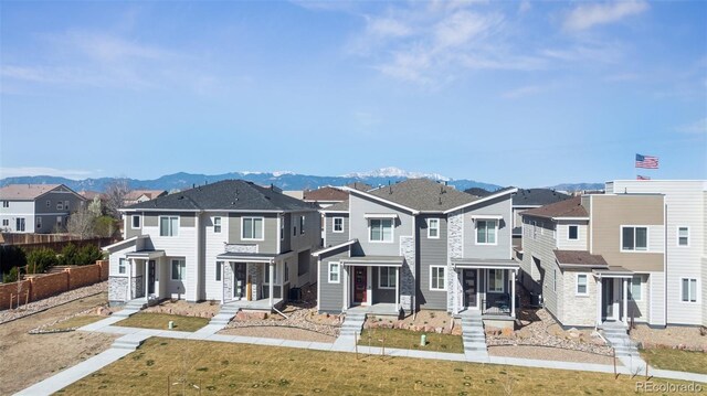 2449 Foerster Grass Vw, Colorado Springs, CO 80915 - view of front of home with a mountain view, fence, and a residential view