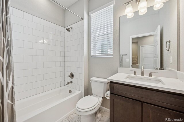 2449 Foerster Grass Vw, Colorado Springs, CO 80915 - bathroom with vanity, toilet, shower / bath combo, and a wealth of natural light