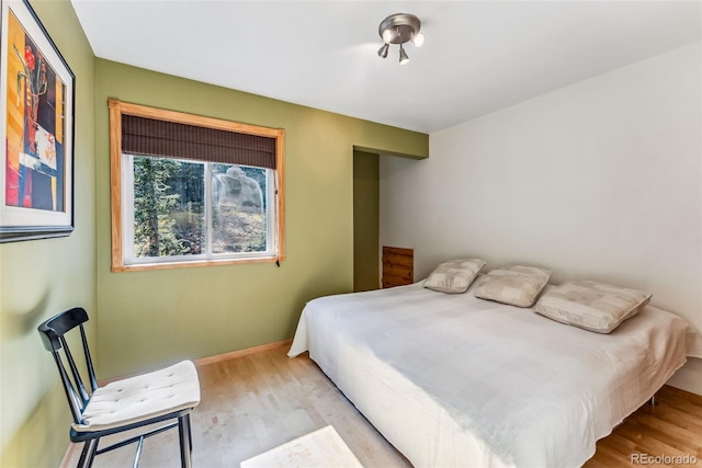 bedroom featuring light hardwood / wood-style flooring