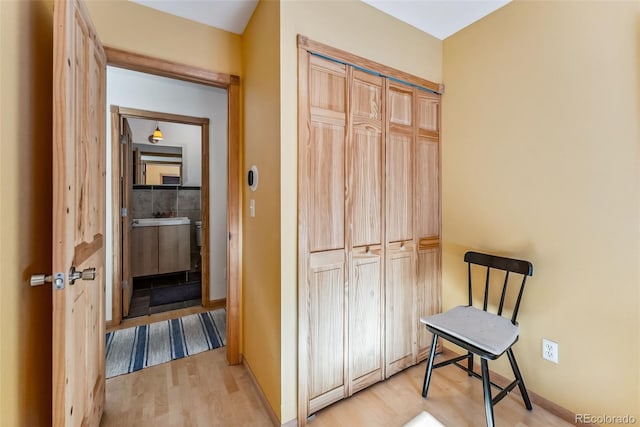 hallway featuring light hardwood / wood-style flooring