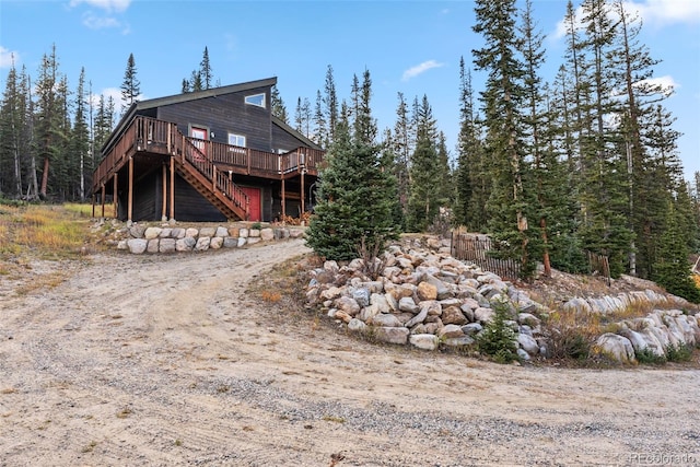 rear view of property with a deck