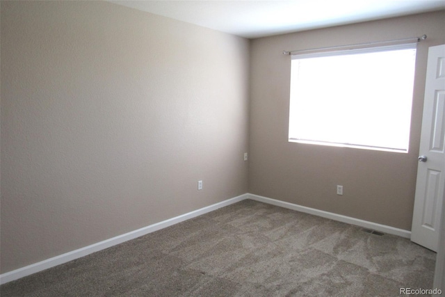 2517 S Genoa St, Aurora, CO 80013 - empty room with light carpet and baseboards